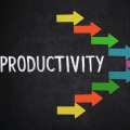 How does productivity improve efficiency?